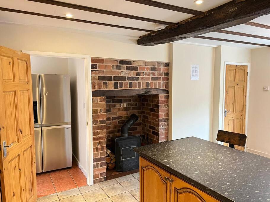 Upper Caerfaelog Farmhouse Llanbister المظهر الخارجي الصورة